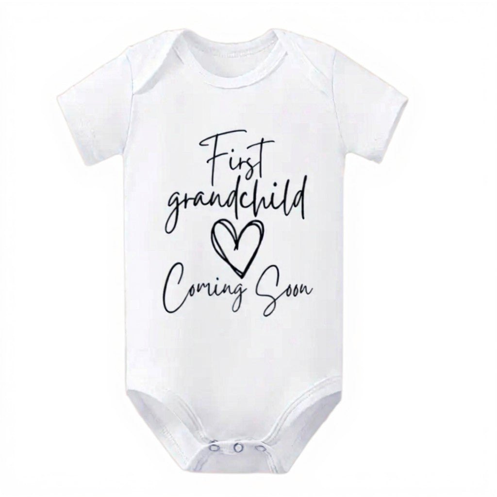 "First grandchild coming soon" bodysuit