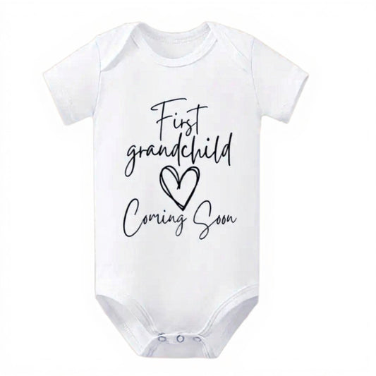 "First grandchild coming soon" bodysuit